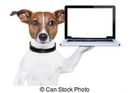 Cão segurando num computador