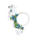 marco circular y mariposas azules.