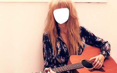 With a guitar/Taylor/ Montage photo