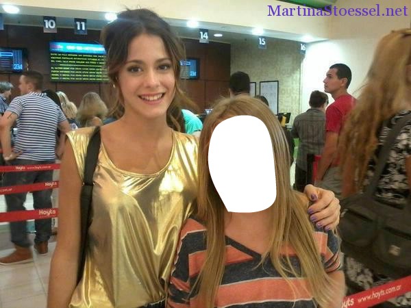 Tini con una fan en el aeropuerto Fotoğraf editörü